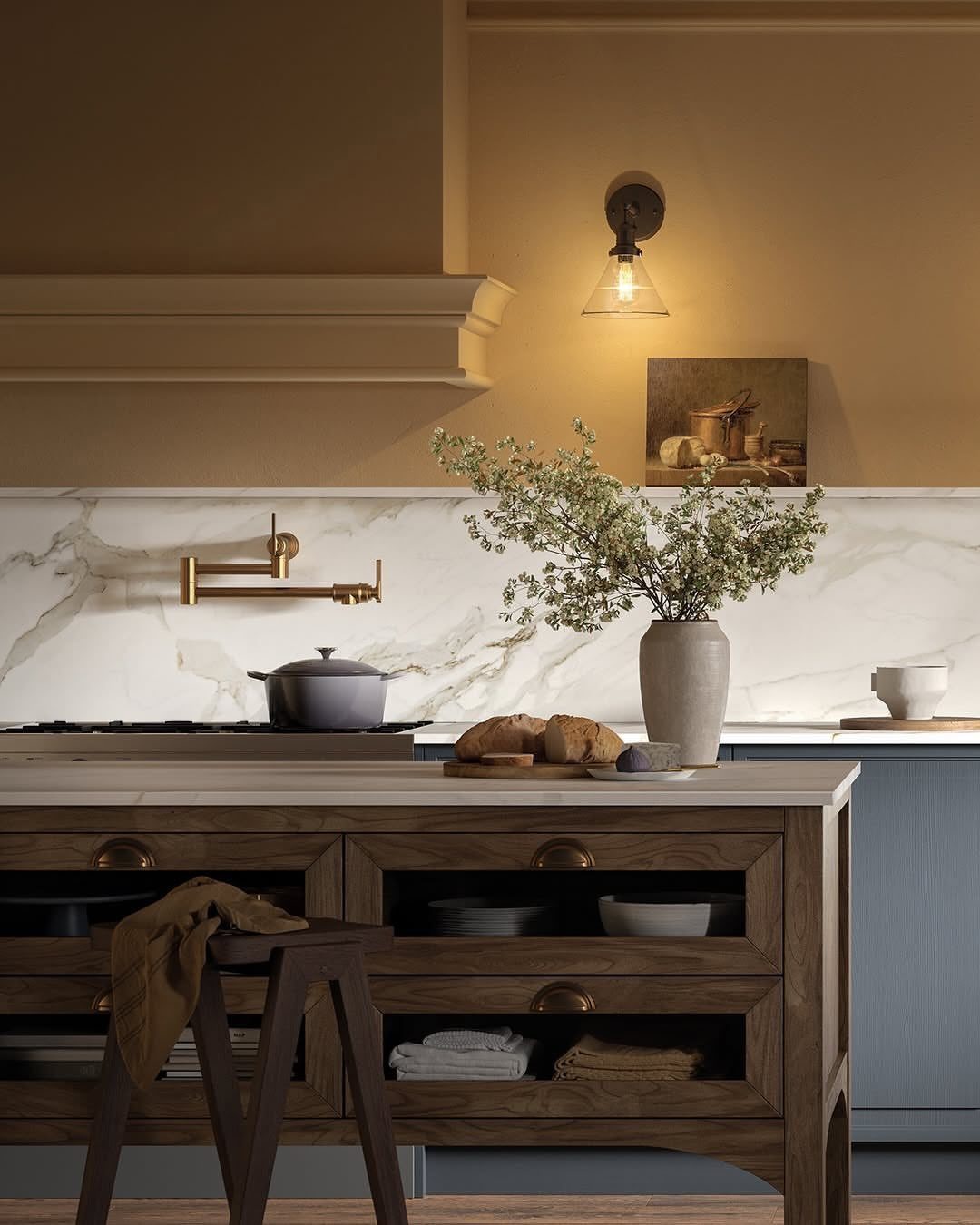 Brass pot filler faucet mounted on a white marble kitchen backsplash above a stove.