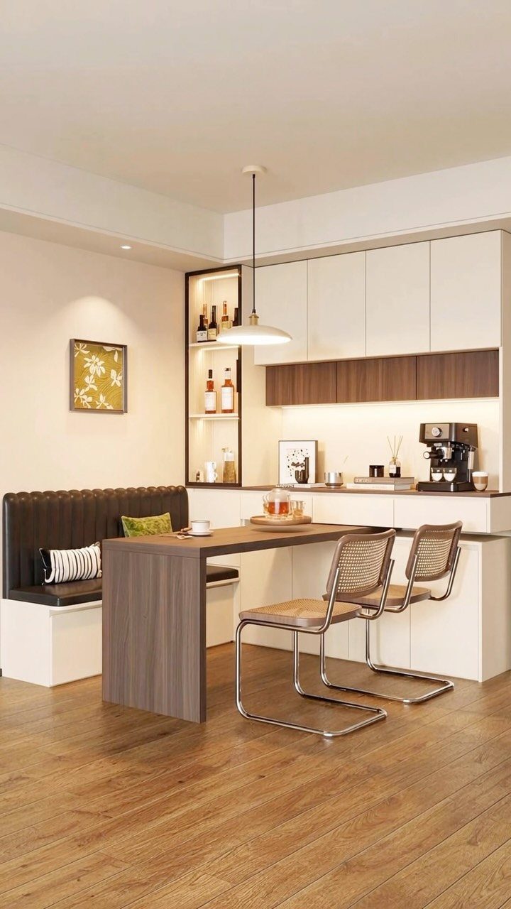 30 Banquette Dining Nook Ideas for Small Kitchens or Corners 30 Dark brown leather banquette and matching wood table in a modern white kitchen.