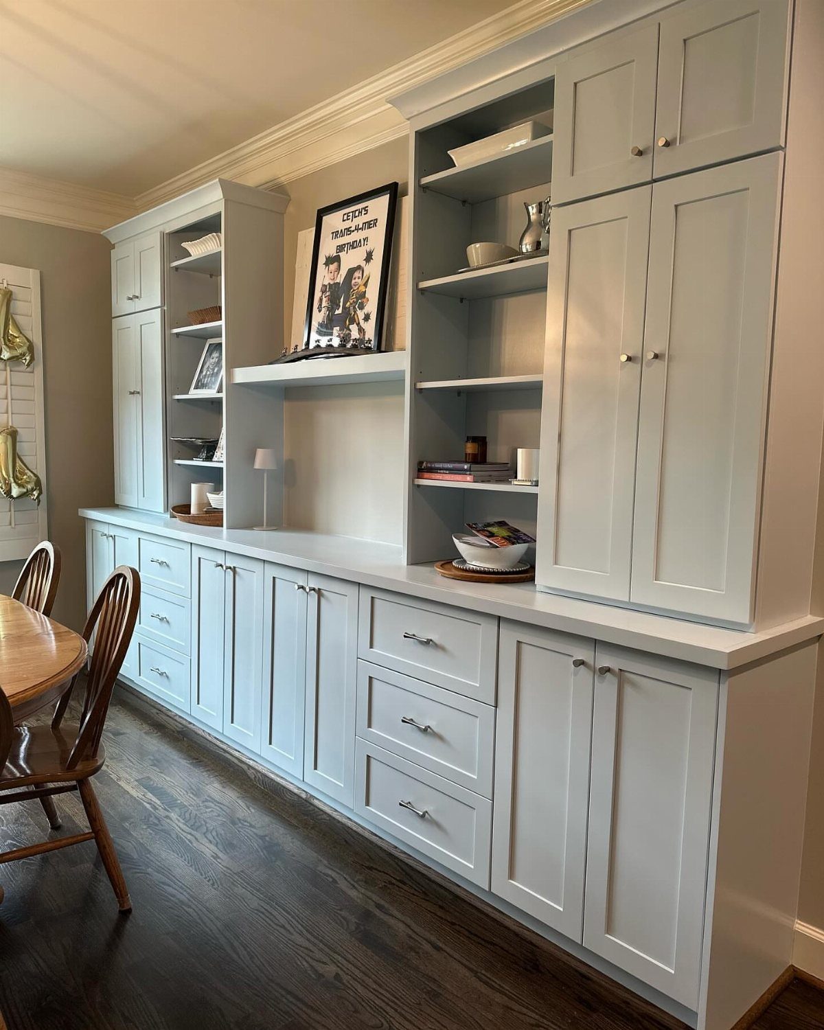 Dining Room Side Cabinet Designs with 18 Stylish Options 5 White built-in dining room cabinets with a long sideboard and upper open shelving.