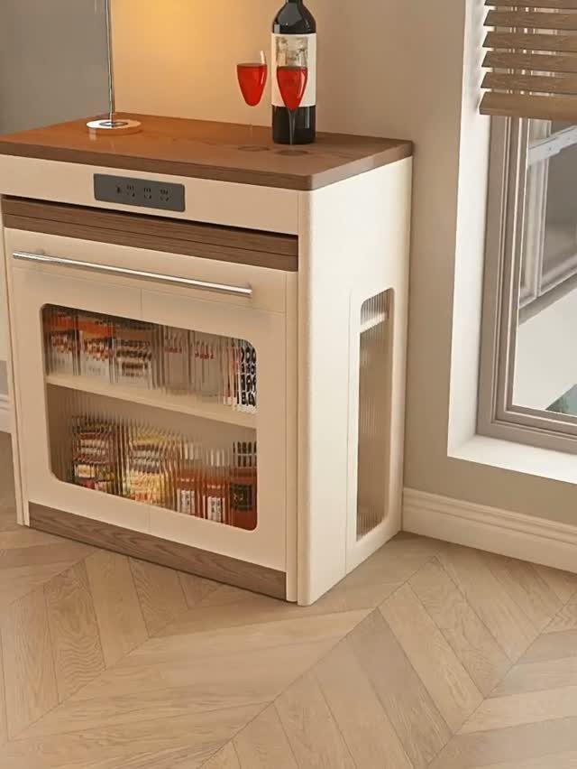 Dining Room Side Cabinet Designs with 18 Stylish Options 14 White sideboard with built-in wine cooler, a bottle of wine, and two glasses.