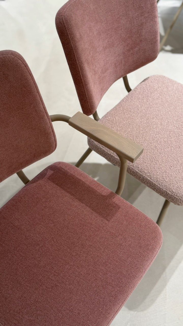 Fabric Chairs Dining Ideas: 32 Styles, Colors, and Frames 27 Mauve fabric dining chairs with wooden armrests and slim metal legs on light flooring.