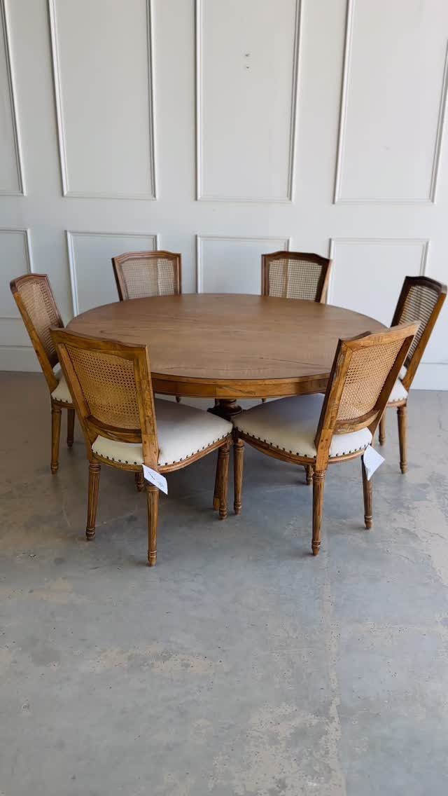 Fabric Chairs Dining Ideas: 32 Styles, Colors, and Frames 5 Round wooden dining table with six cane back chairs and white upholstered seats.