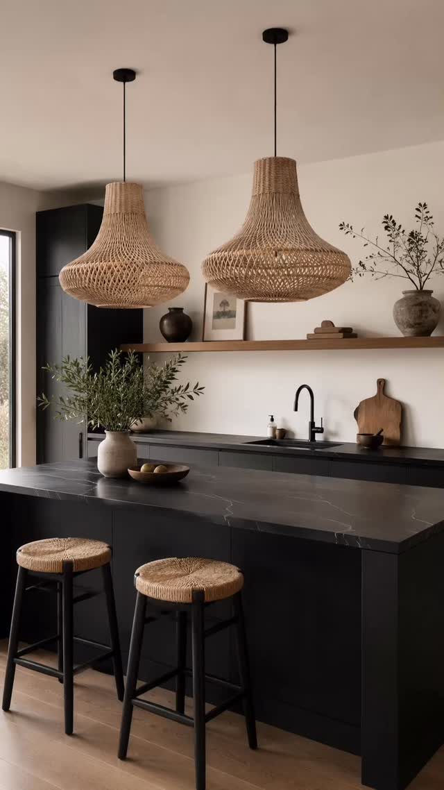 28 Kitchen Cabinets Remodel Ideas and Photos to Try in 2026 19 Two woven wicker pendant lights hanging above a black marble kitchen island.