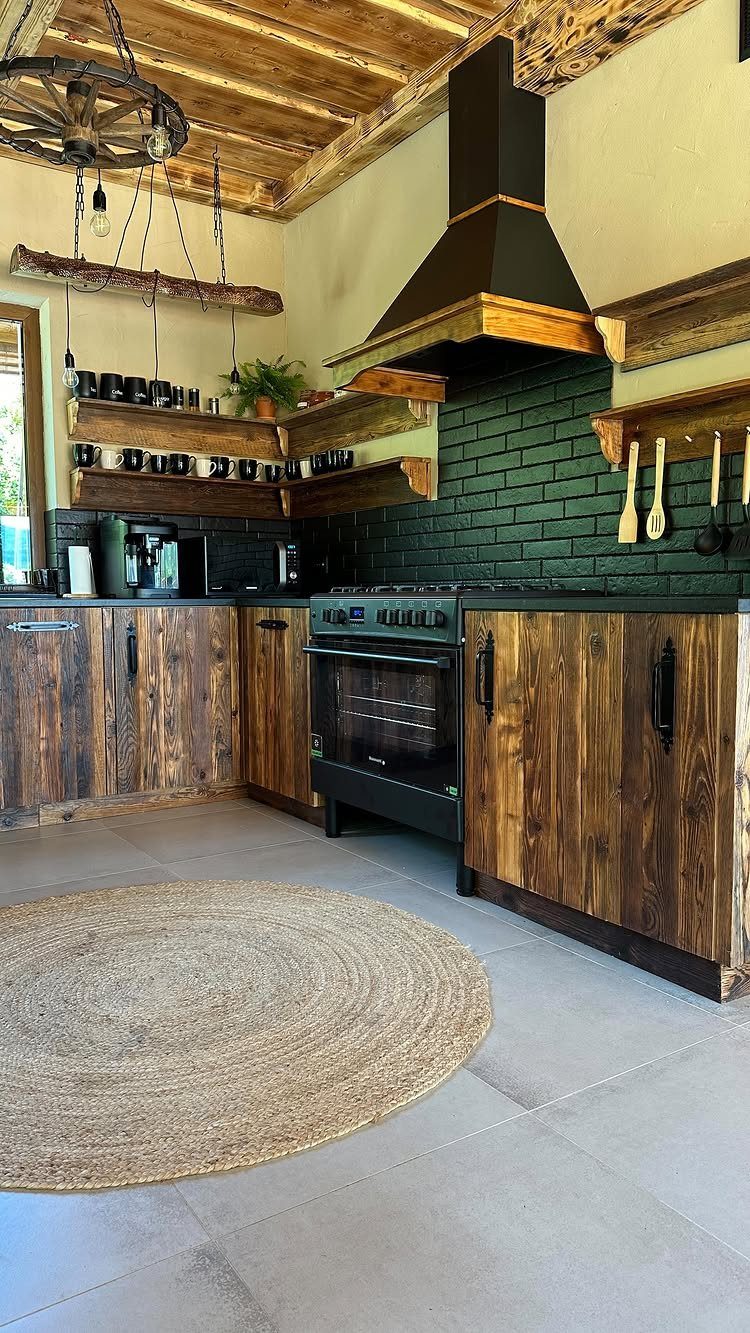 Wood plank ceiling above a rustic kitchen with dark wood cabinets and black accents.