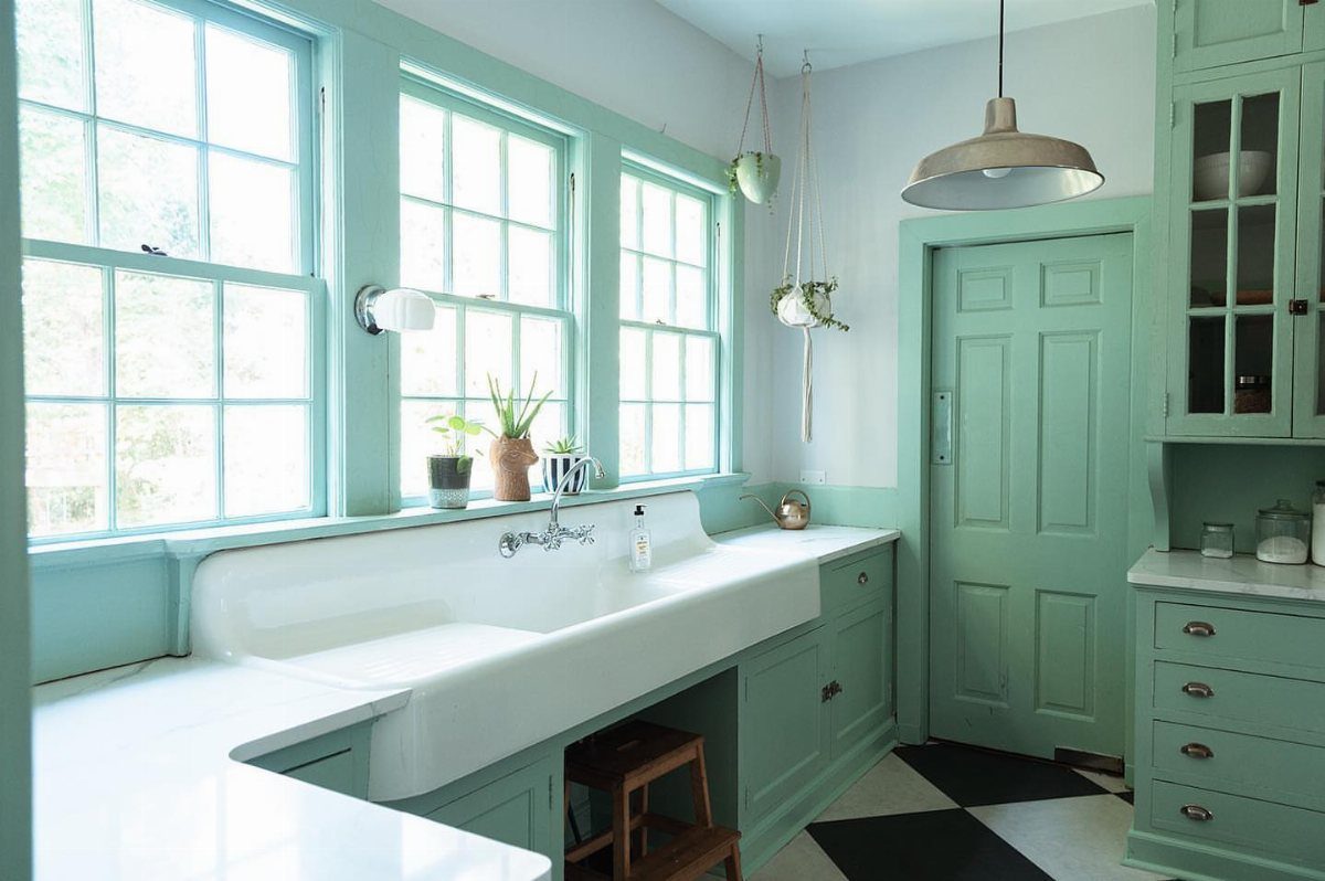 15 Kitchen Style L Shape Ideas, from Islands to Backsplashes 8 Mint green vintage cabinets and a large white farmhouse sink in a bright kitchen.