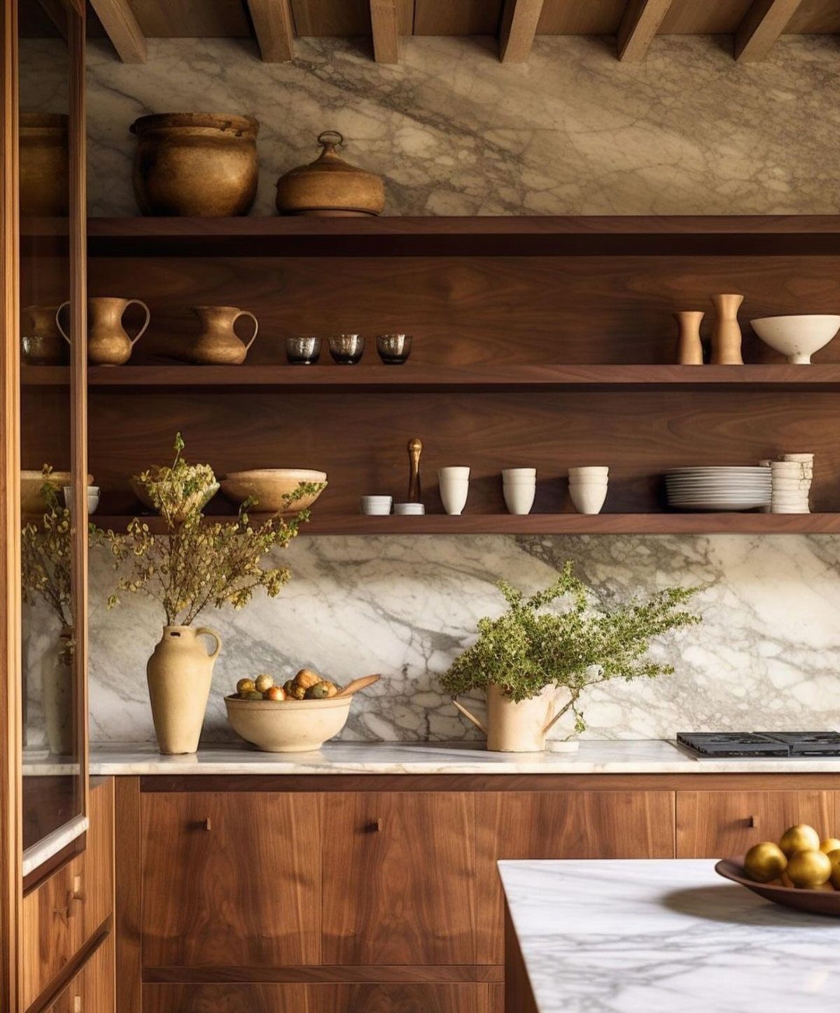10 Mid Century Modern Kitchen Remodel Ideas for Your Home 1 Walnut wood kitchen cabinets and open shelving against a white marble backsplash.