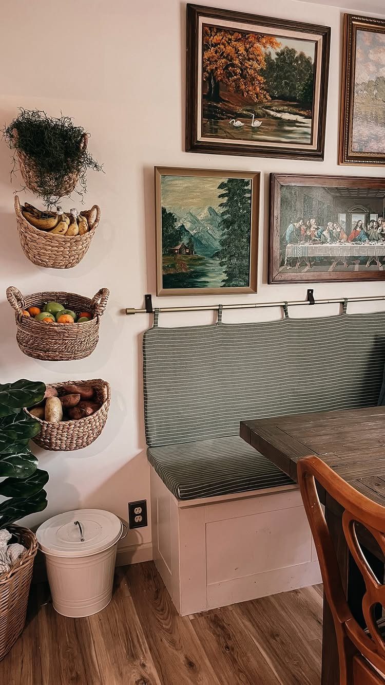 Woven baskets mounted vertically on a wall above a built-in dining bench.