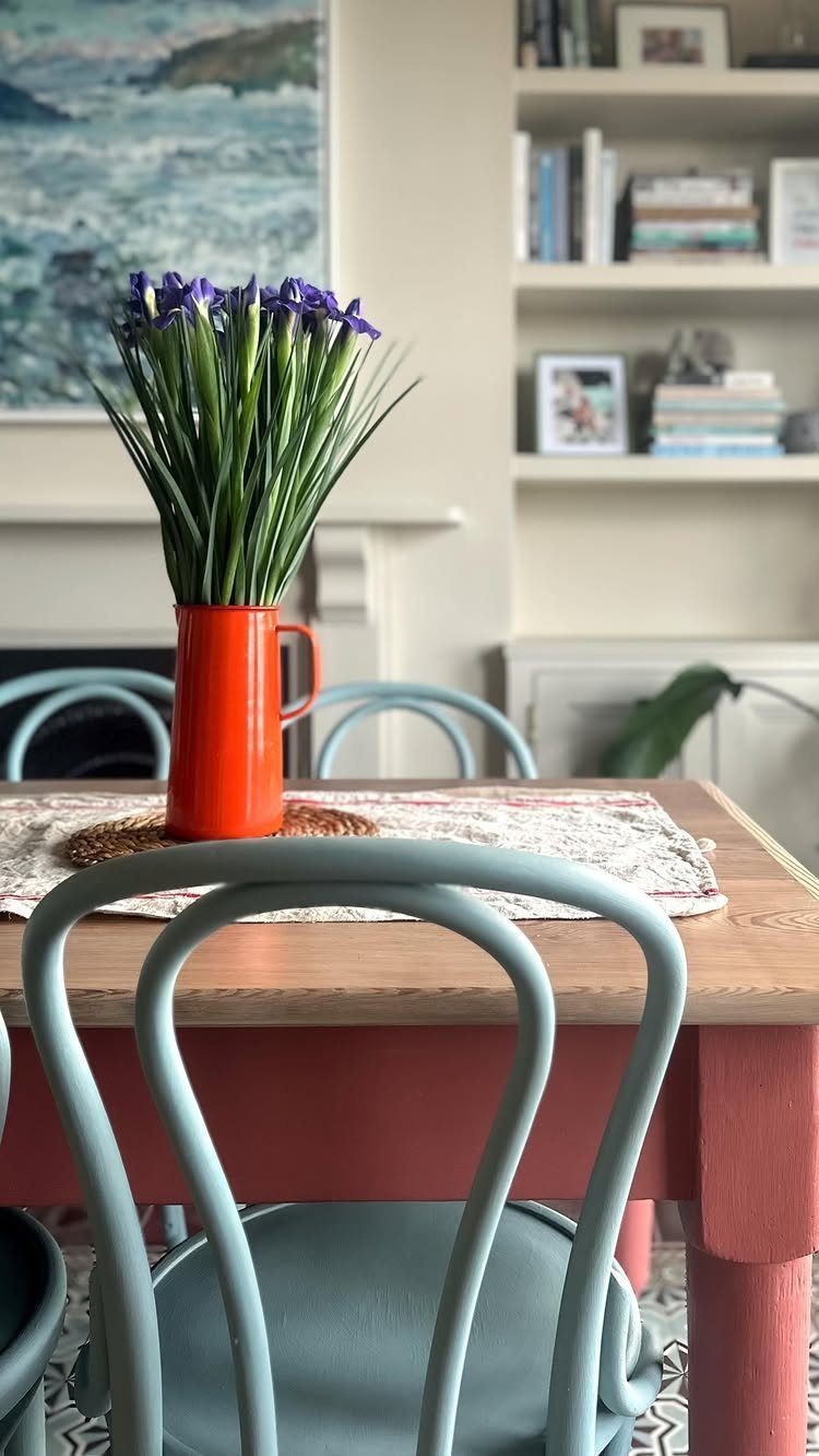 Painting Kitchen Table Ideas: 11 Looks From Yellow to Black 6 Wooden kitchen table with natural top and pink painted base and blue chairs