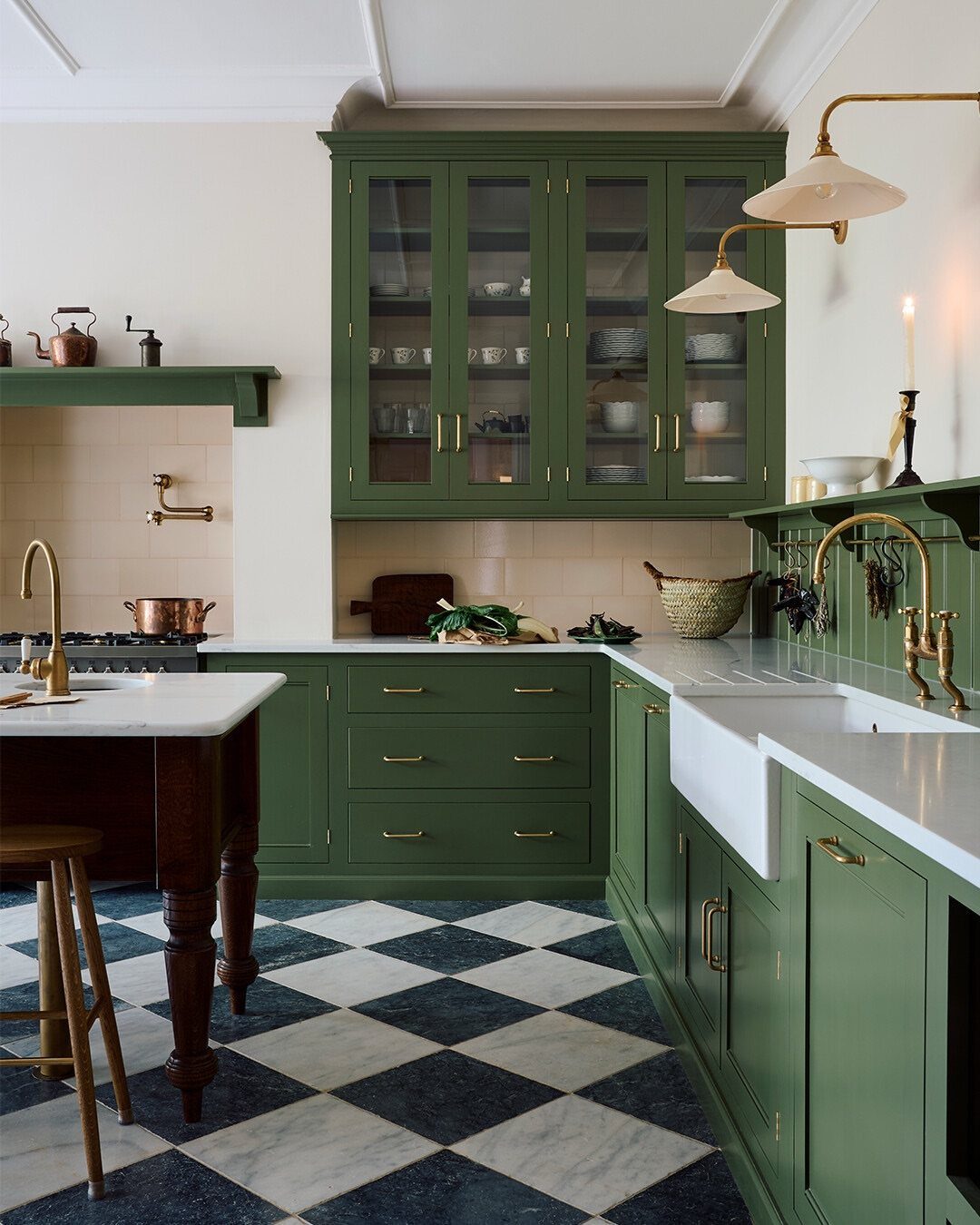 UK Kitchen Ideas Green: 21 Cabinet, Tile and Worktop Looks 10 Cream square tiles backsplash in a kitchen with sage green cabinets and checkered flooring.