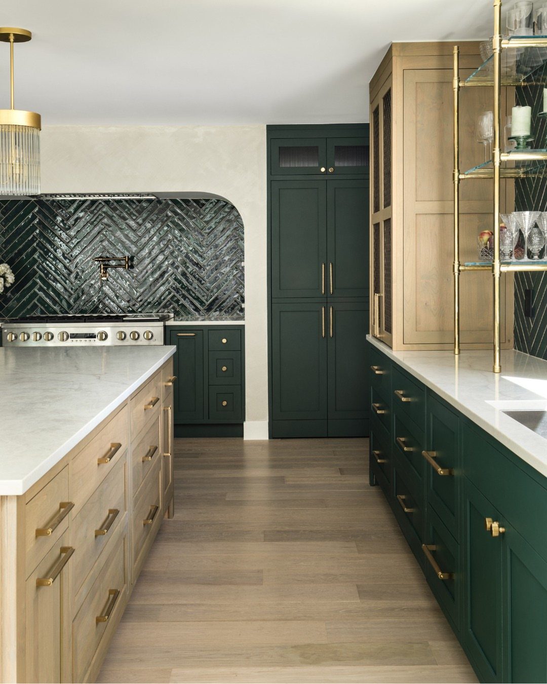 UK Kitchen Ideas Green: 21 Cabinet, Tile and Worktop Looks 16 Modern kitchen with dark green cabinets, herringbone tile backsplash, and light wood accents.