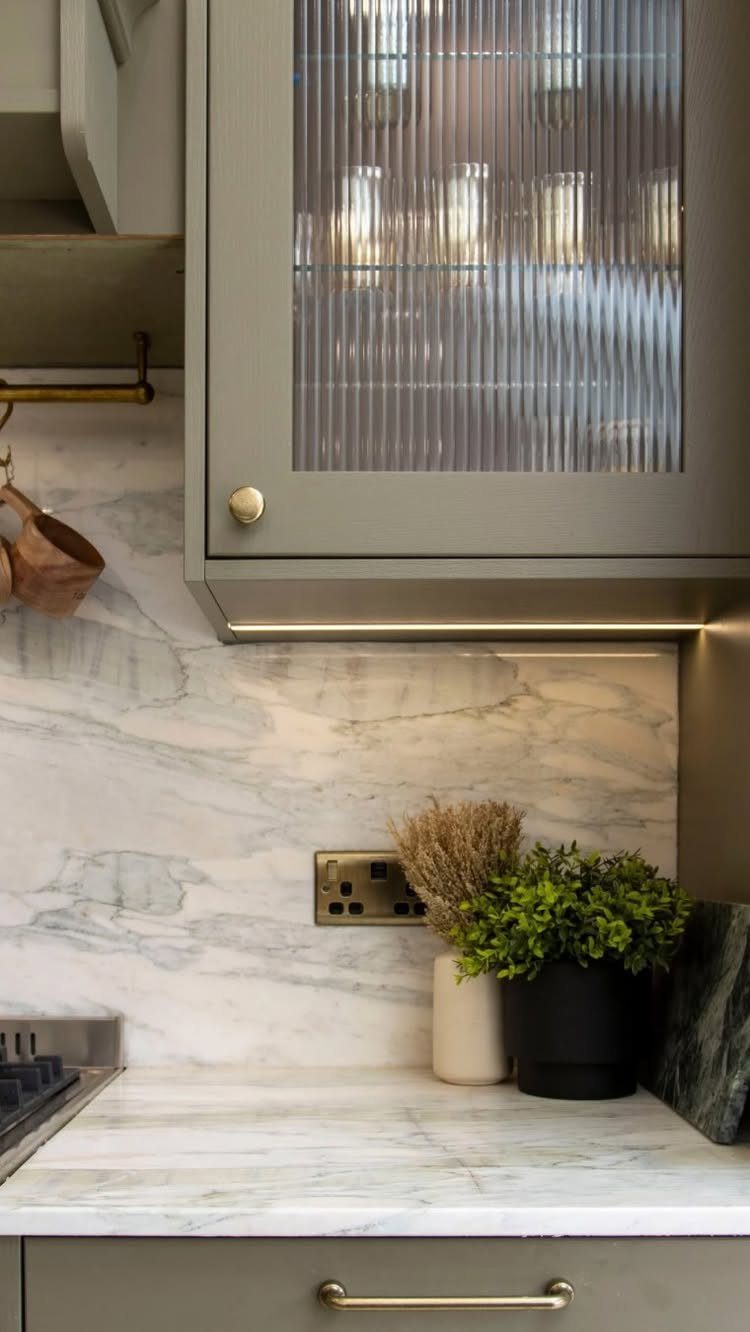 UK Kitchen Ideas Green: 21 Cabinet, Tile and Worktop Looks 18 Sage green kitchen cabinet with fluted glass door and white marble countertop