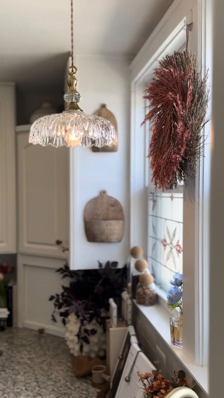 Vintage Kitchen Lighting Fixtures: 12 Pendant and Sconce Ideas 10 Vintage pendant light with ruffled glass shade hanging in a bright white kitchen